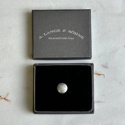 A. Lange & Söhne Silver Suit Pin For Formal Attire | Timeless Elegance