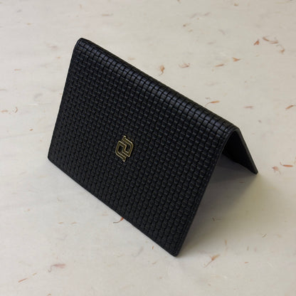 Roger Dubuis Black Leather Passport Holder With Intrecciato Weave Pattern | Luxe Travel Essentials