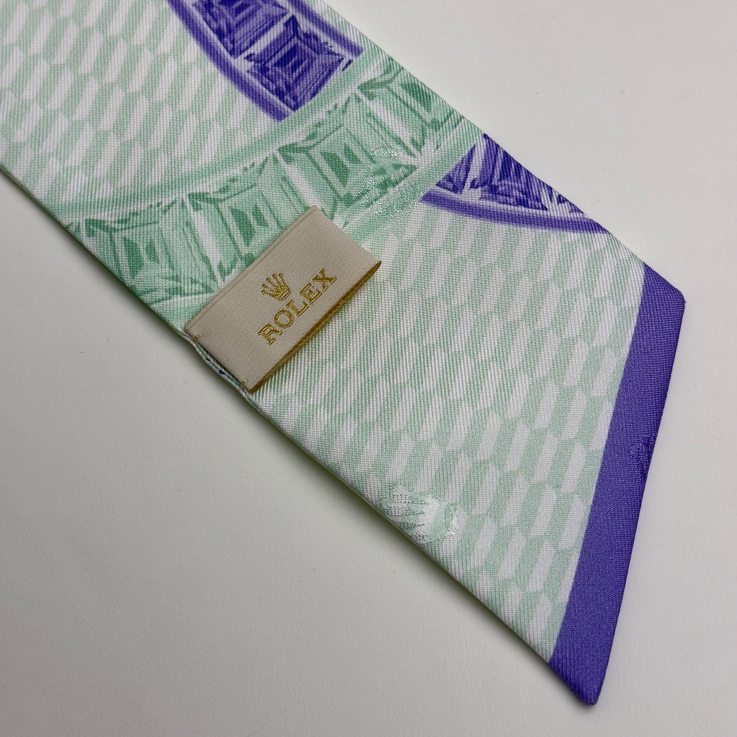 Rolex Silk Tie - Daytona Diamond Pattern In Green & Purple | Elegant Luxury Accessory