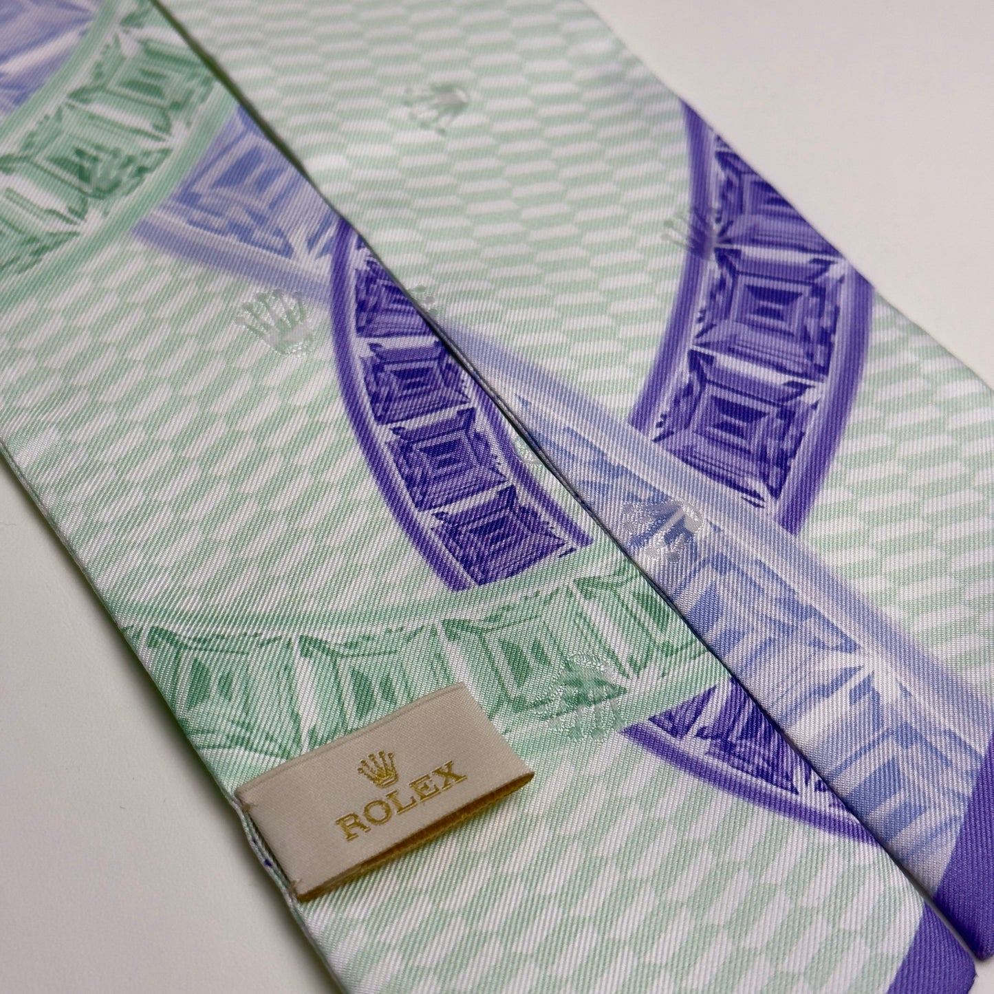 Rolex Silk Tie - Daytona Diamond Pattern In Green & Purple | Elegant Luxury Accessory