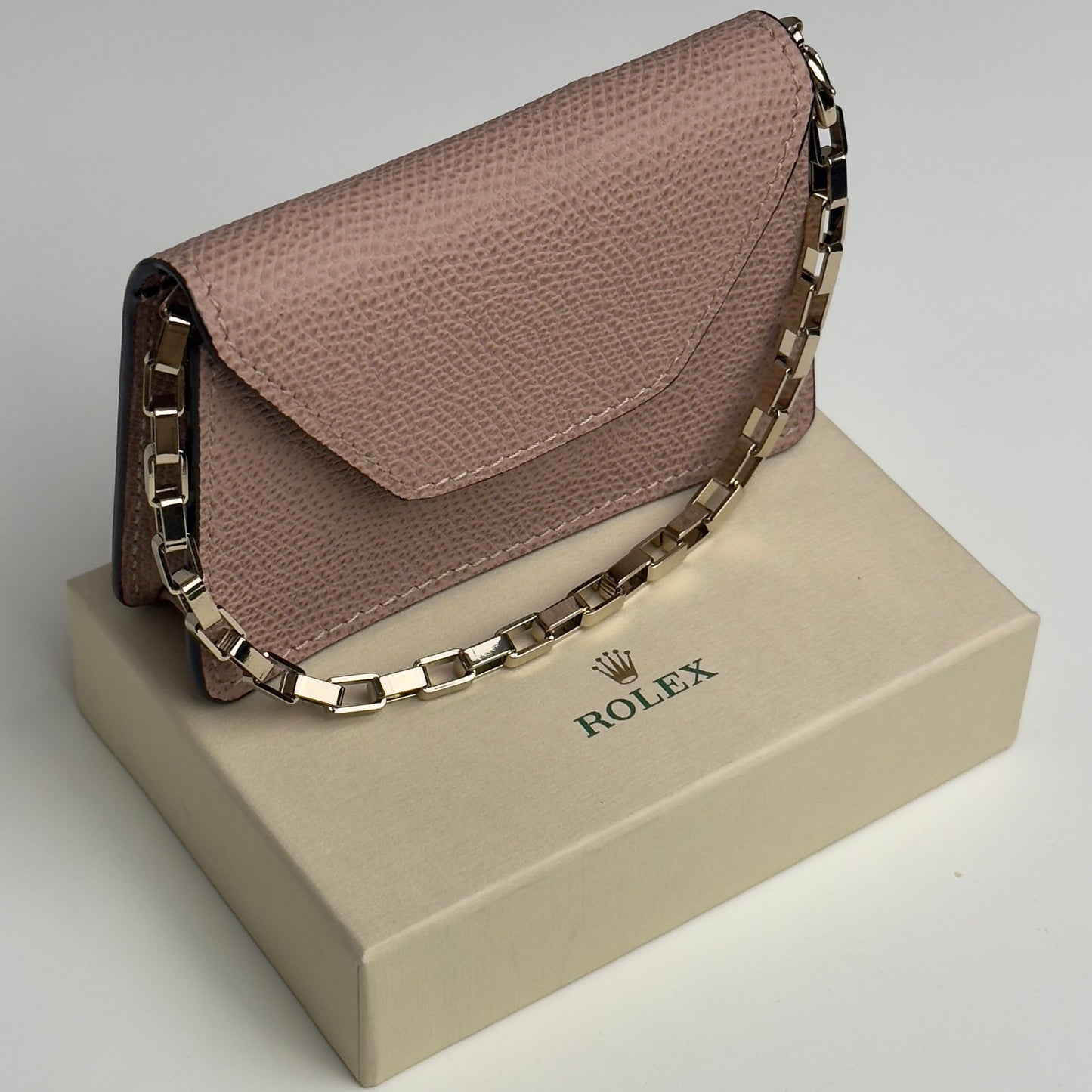 Rolex Dusty Rose Leather Mini Pouch With Gold Chain Strap For Rolex | Elegant Accessory