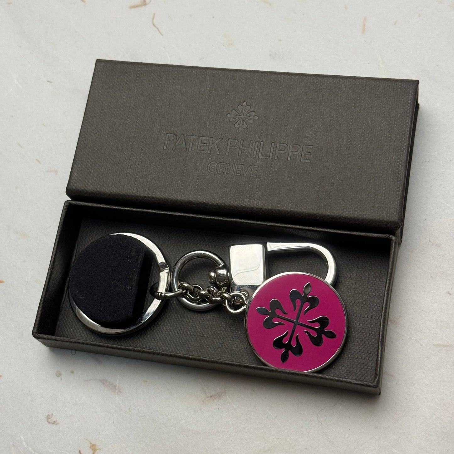 Patek Philippe Calatrava Cross Keychain In Stainless Steel Pink Edition | Refined Accessory For Watch Enthusiasts