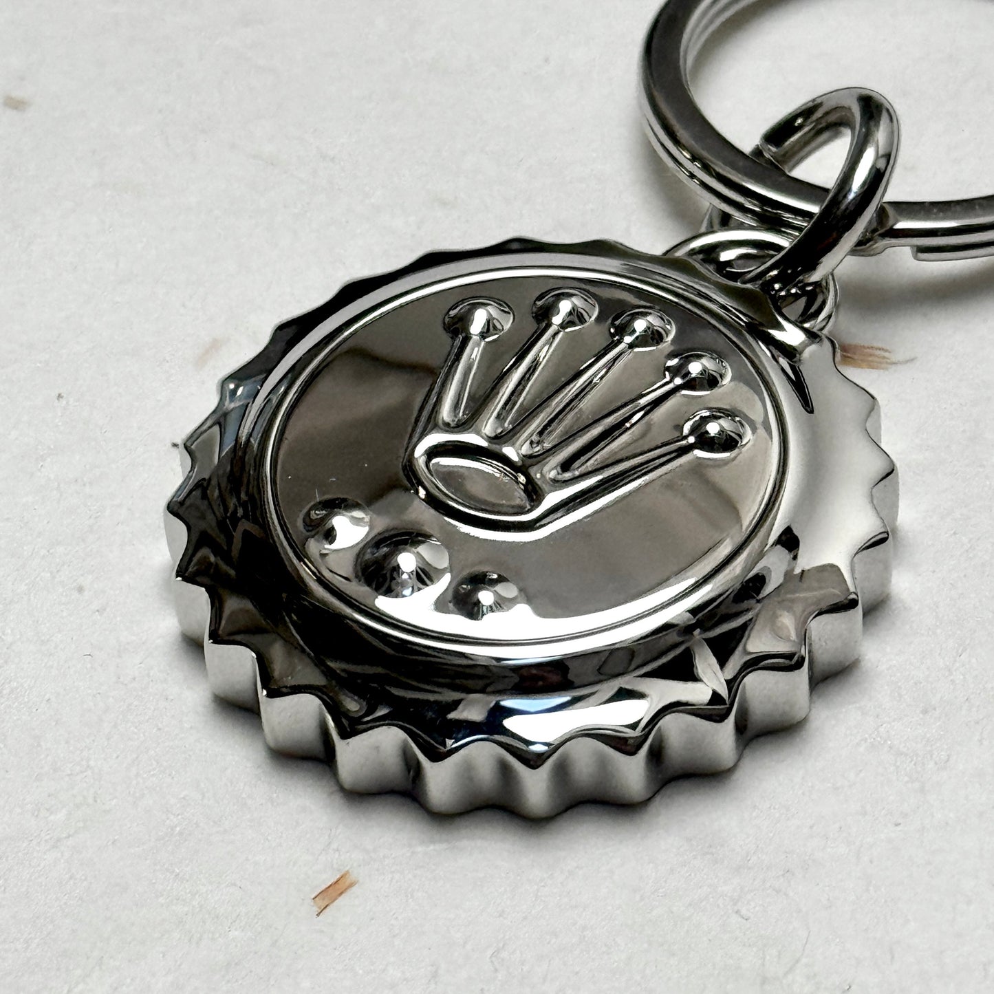 Rolex Triplock Emblem Keyring In Polished Metallic Finish | Luxury Collectible Keychain