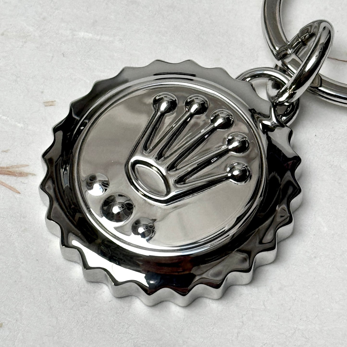 Rolex Triplock Emblem Keyring In Polished Metallic Finish | Luxury Collectible Keychain