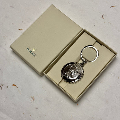 Rolex Triplock Emblem Keyring In Polished Metallic Finish | Luxury Collectible Keychain