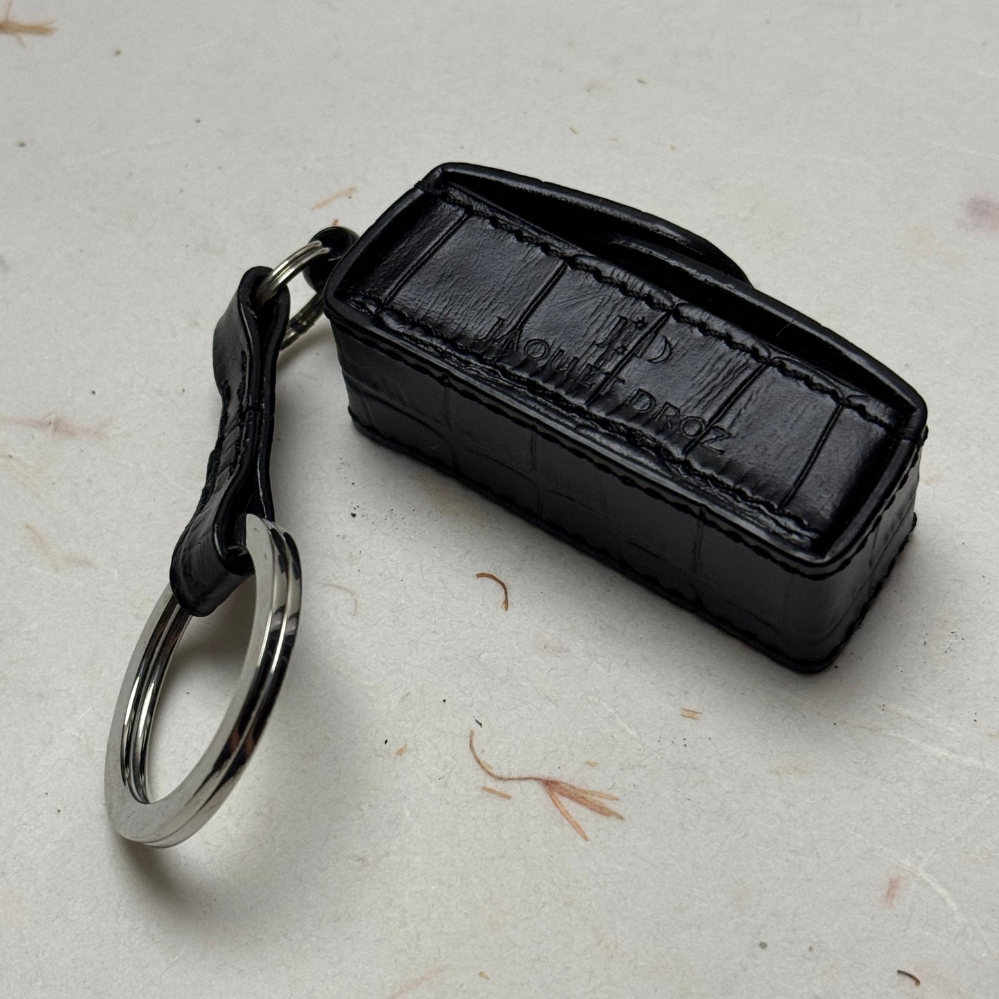 Jaquet Droz Twin Star Dice Keychain - Leather Accessory For Watch Enthusiasts