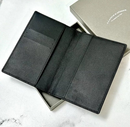 A Lange & Sohne Black Calfskin Passport Holder For Luxury Travel | Stylish Travel Accessory