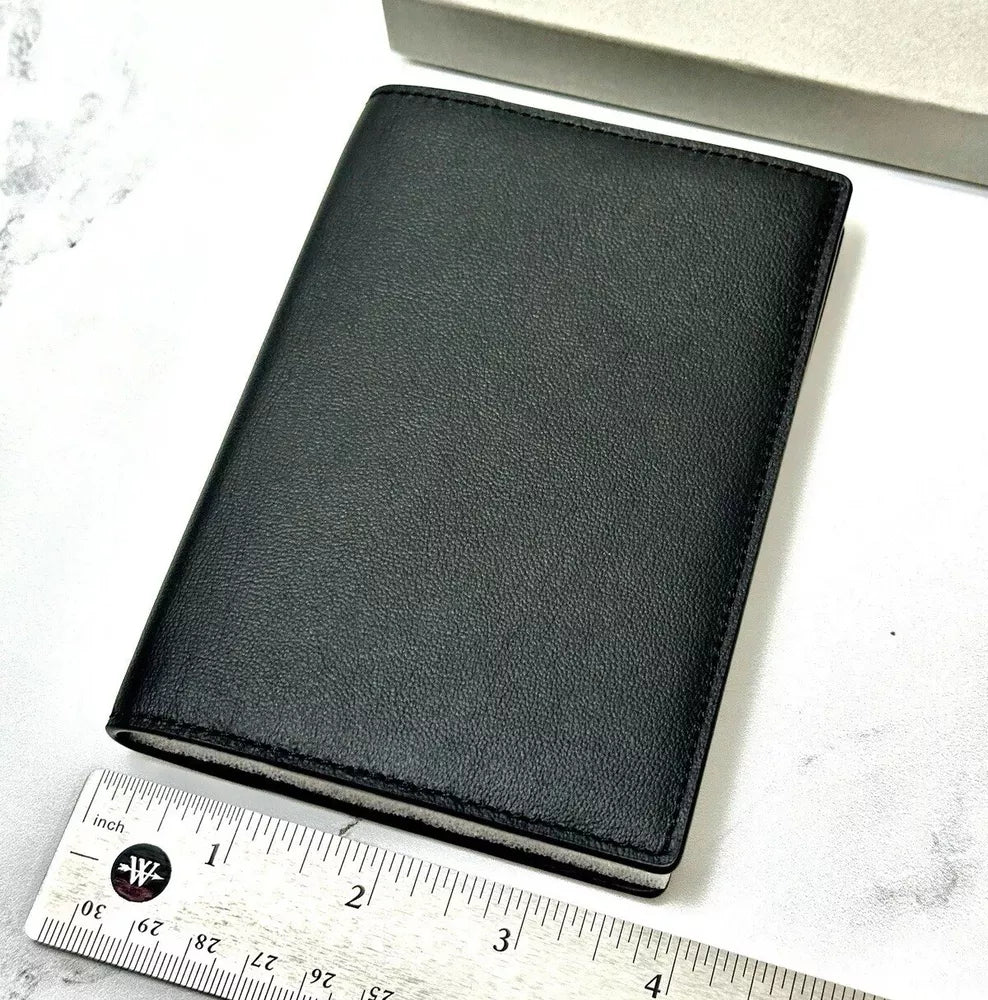 A Lange & Sohne Black Calfskin Passport Holder For Luxury Travel | Stylish Travel Accessory