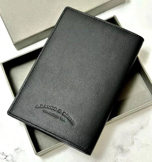 A Lange & Sohne Black Calfskin Passport Holder For Luxury Travel | Stylish Travel Accessory